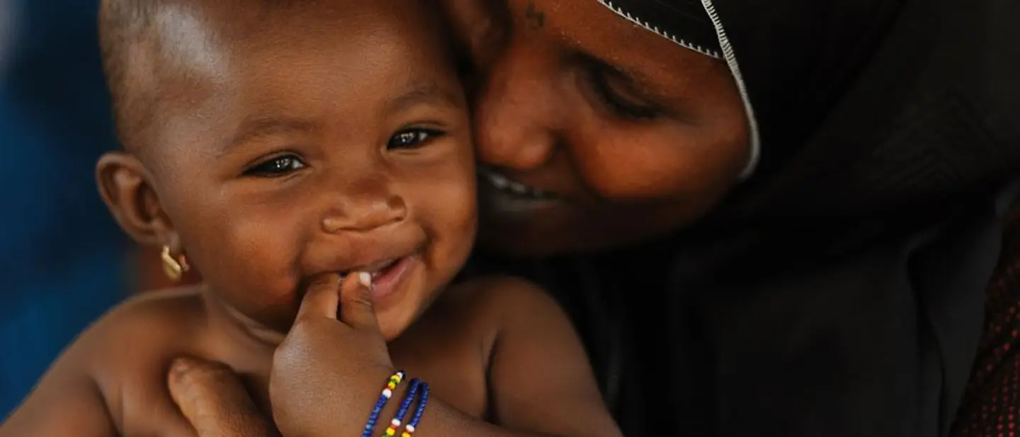 Überleben und Entwicklung: Mutter mit Baby | © UNICEF/Quarmyne Überleben und Entwicklung: Mutter mit Baby