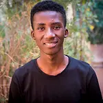 Der 18-jährige Amadou hat Wünsche für die Kinder aus Mali. | © UNICEF/Keïta Mali: Ein 18-jähriger Junge lächelt freundlich in die Kamera.