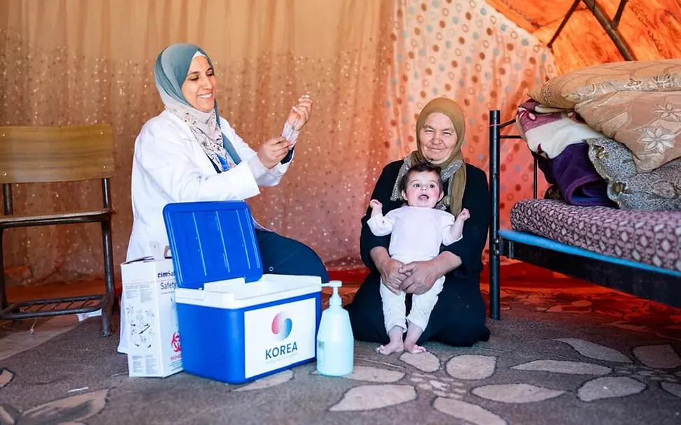 Masern gefährlich: Ein Kind in Jordanien wird gegen Masern geimpft, um nicht angesteckt zu werden