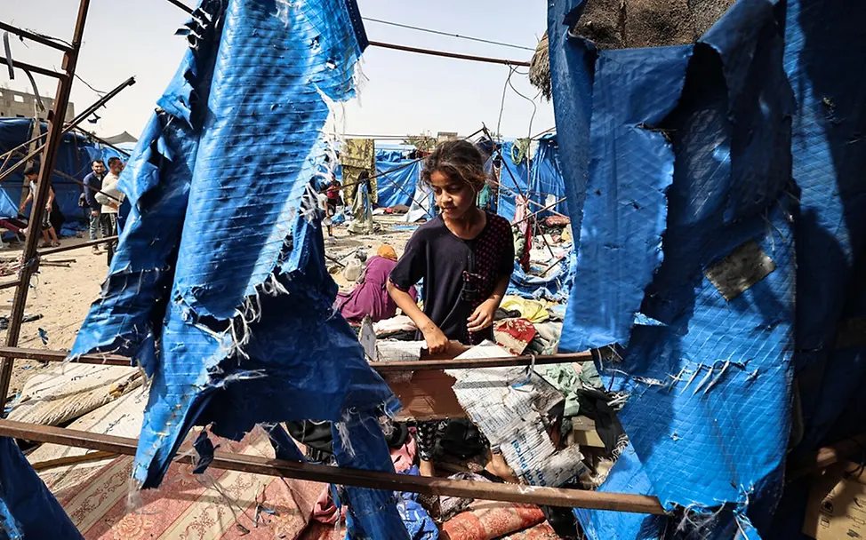 Ein Mädchen inmitten der Zerstörung im Gazastreifen. | © UNICEF/El Baba Ein Mädchen inmitten der Zerstörung im Gazastreifen.