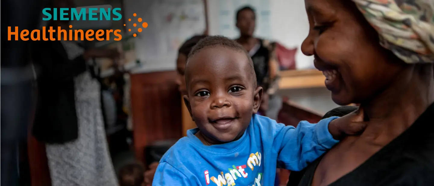 Siemens Healthineers | © UNICEF Ein Kind lächelt in die Kamera