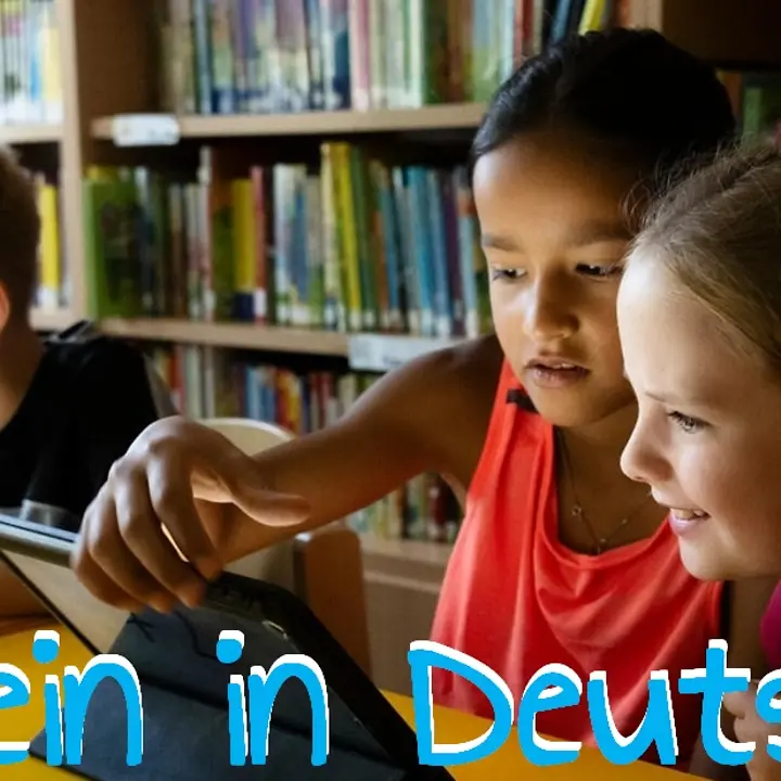 Cologne-Longerich, 25 June 2025: Children looking at a tablet at Gartenstadt Primary School in Cologne-Longerich