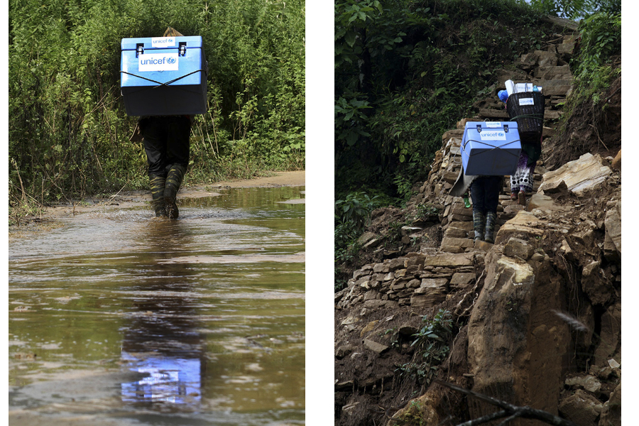 Die UNICEF-Helfer in Nepal klettern mit den Impfstoffen Nepal: UNICEF-Helfer kämpfen sich durch unwegsames Gelände