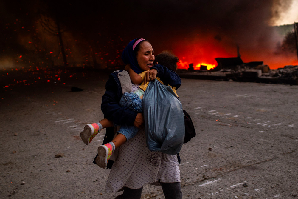 Lesbos, Greece: The flames of misery | © Angelos Tzortzinis, Greece (AFP) Lesbos, Greece: The flames of misery