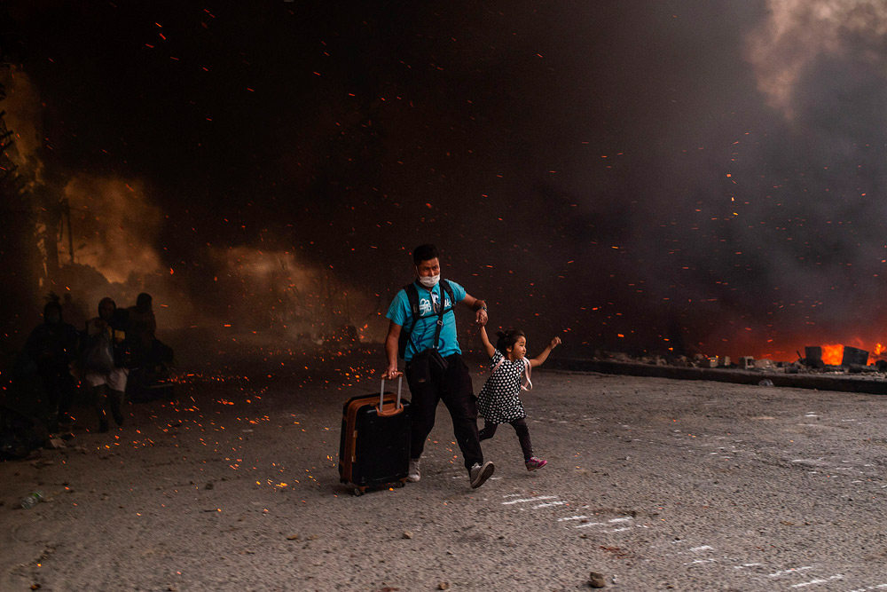 Lesbos, Greece: The flames of misery | © Angelos Tzortzinis, Greece (AFP) Lesbos, Greece: The flames of misery