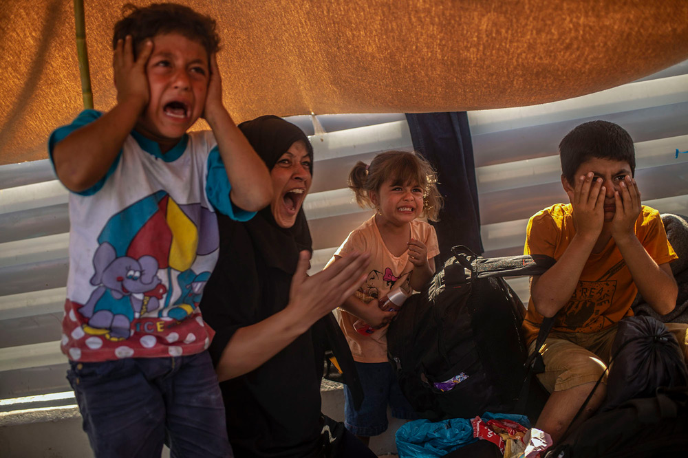Lesbos, Greece: The flames of misery | © Angelos Tzortzinis, Greece (AFP) Lesbos, Greece: The flames of misery