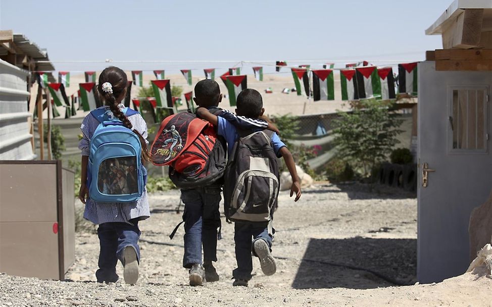Schulkinder auf dem Weg nach Hause im Westjordanland. © UNICEF/Izhiman